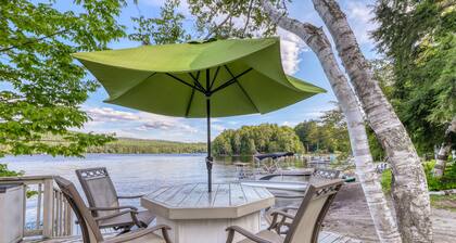 Peaceful lakefront house with private dock and sandy beach