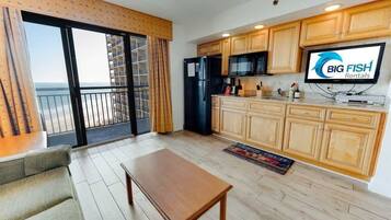 Fridge, microwave, stovetop, coffee/tea maker