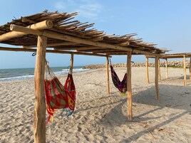 On the beach, free beach cabanas, sun loungers, beach umbrellas