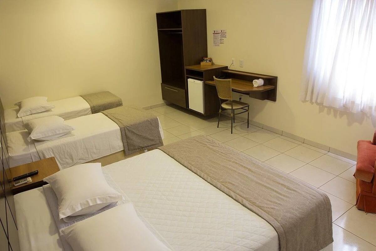Family Room, Multiple Beds, Non Smoking | Minibar, desk, WiFi (free), bed sheets