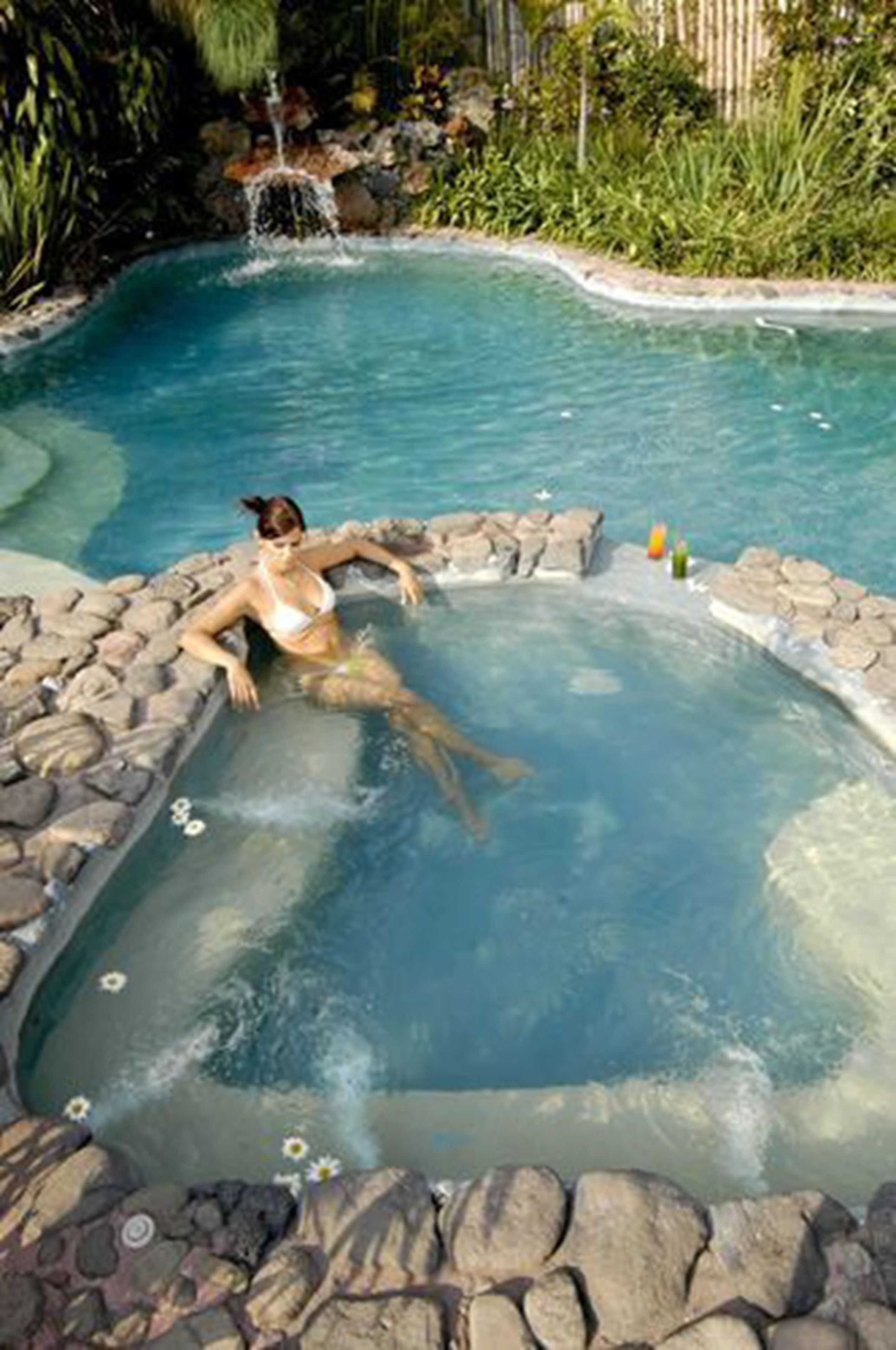 outdoor pool, open 9:00 am to 9:00 pm, pool umbrellas, pool loungers