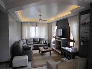 LCD TV, fireplace, DVD player, ping pong