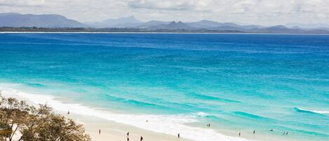 On the beach, sun-loungers, beach towels