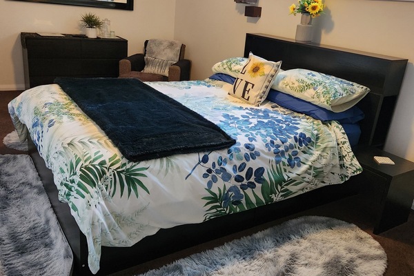 Lovely separate Master Bedroom with TV and armchair for privacy from otherguests