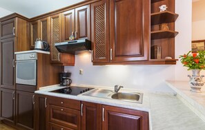 Fridge, microwave, stovetop, coffee/tea maker