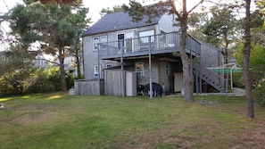 Backyard with outdoor shower under the deck