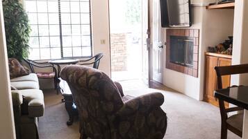 Smart TV, fireplace, DVD player, books