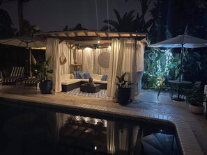 Outdoor pool, a heated pool - The Place,  a beautiful  private and quiet, cozy, room with microwave refrig.  (Fort Lauderdale)