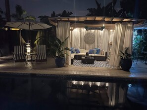 Outdoor pool, a heated pool - The Place,  a beautiful  private and quiet, cozy, room with microwave refrig.  (Fort Lauderdale)