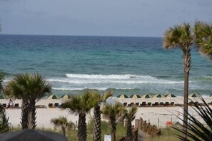 On the beach, sun-loungers