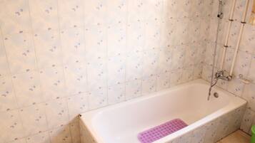 Standard Double Room, 1 Double Bed | Bathroom | Shower, free toiletries, hair dryer, slippers