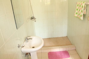 Standard Double Room, 1 Double Bed | Bathroom | Shower, free toiletries, hair dryer, slippers