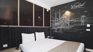 A hotel room with a bed, a large window, and a wall mural of Istanbul. - Vila Europa (Struga)