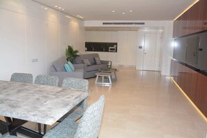 Apartment, 3 Bedrooms | Living area | Flat-screen TV - Renovated White 3BD next to Beach - Pool (Eilat)