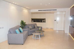Apartment, 3 Bedrooms | Living area | Flat-screen TV - Renovated White 3BD next to Beach - Pool (Eilat)