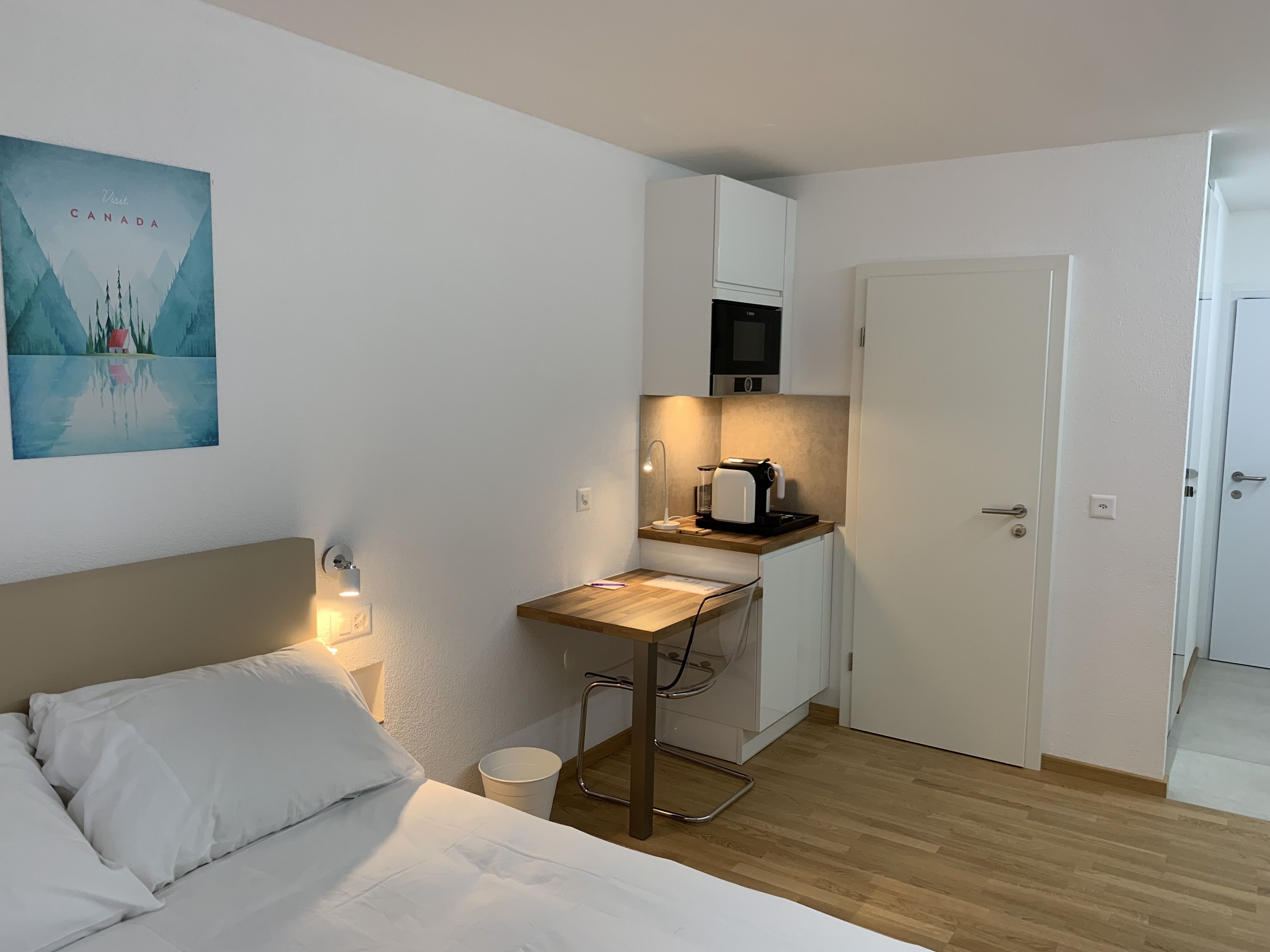 business room | premium bedding, select comfort beds, desk, laptop workspace