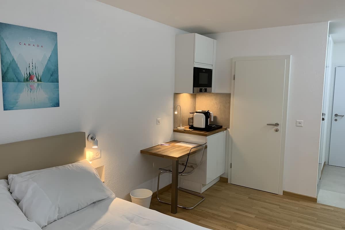 business room | premium bedding, select comfort beds, desk, laptop workspace