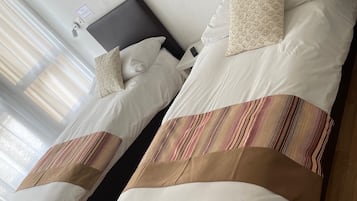 Premium bedding, Select Comfort beds, free minibar, desk