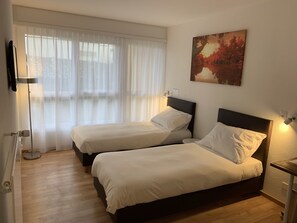 Economy Room | Premium bedding, desk, laptop workspace, free WiFi