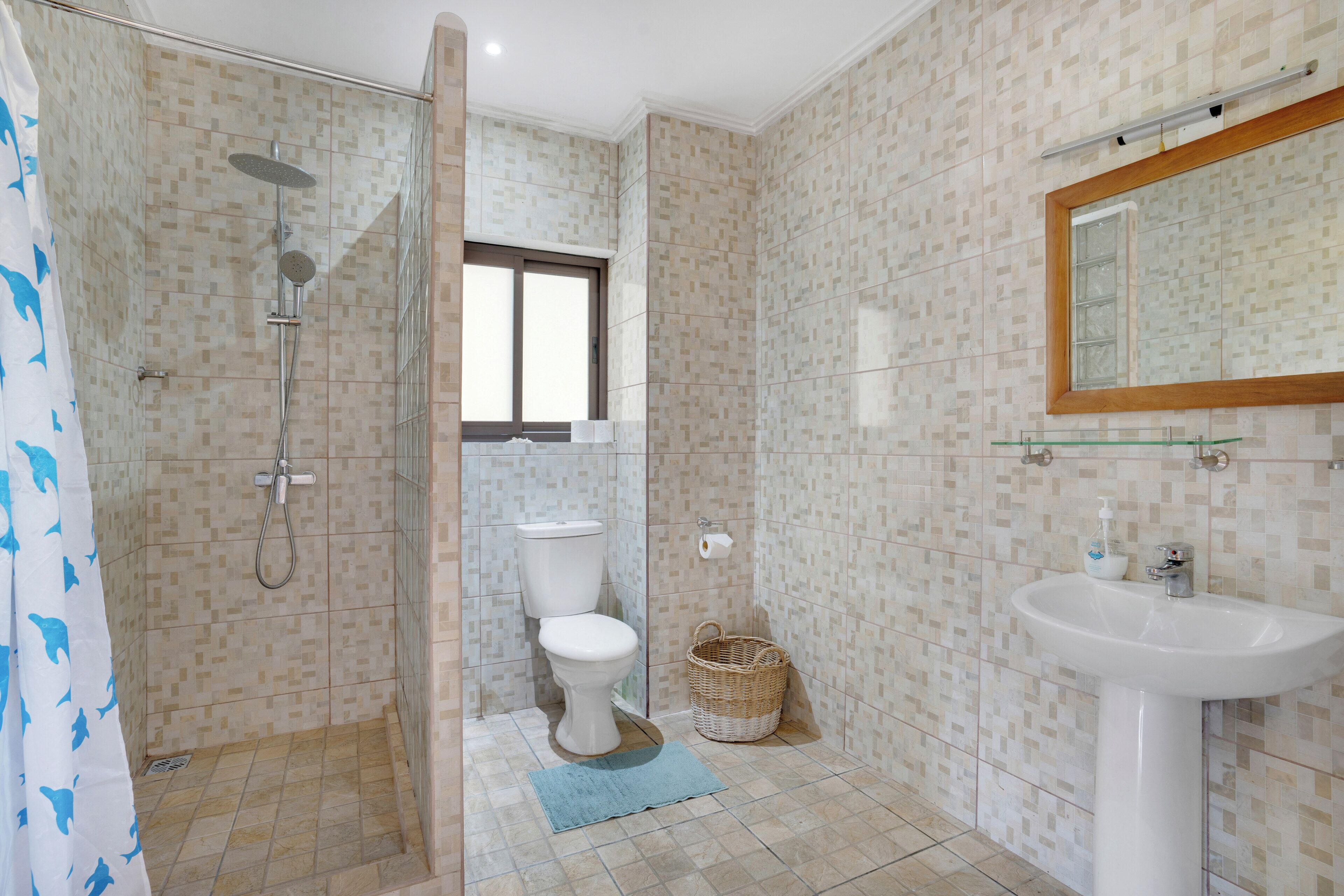 Shower, rainfall showerhead, towels, toilet paper