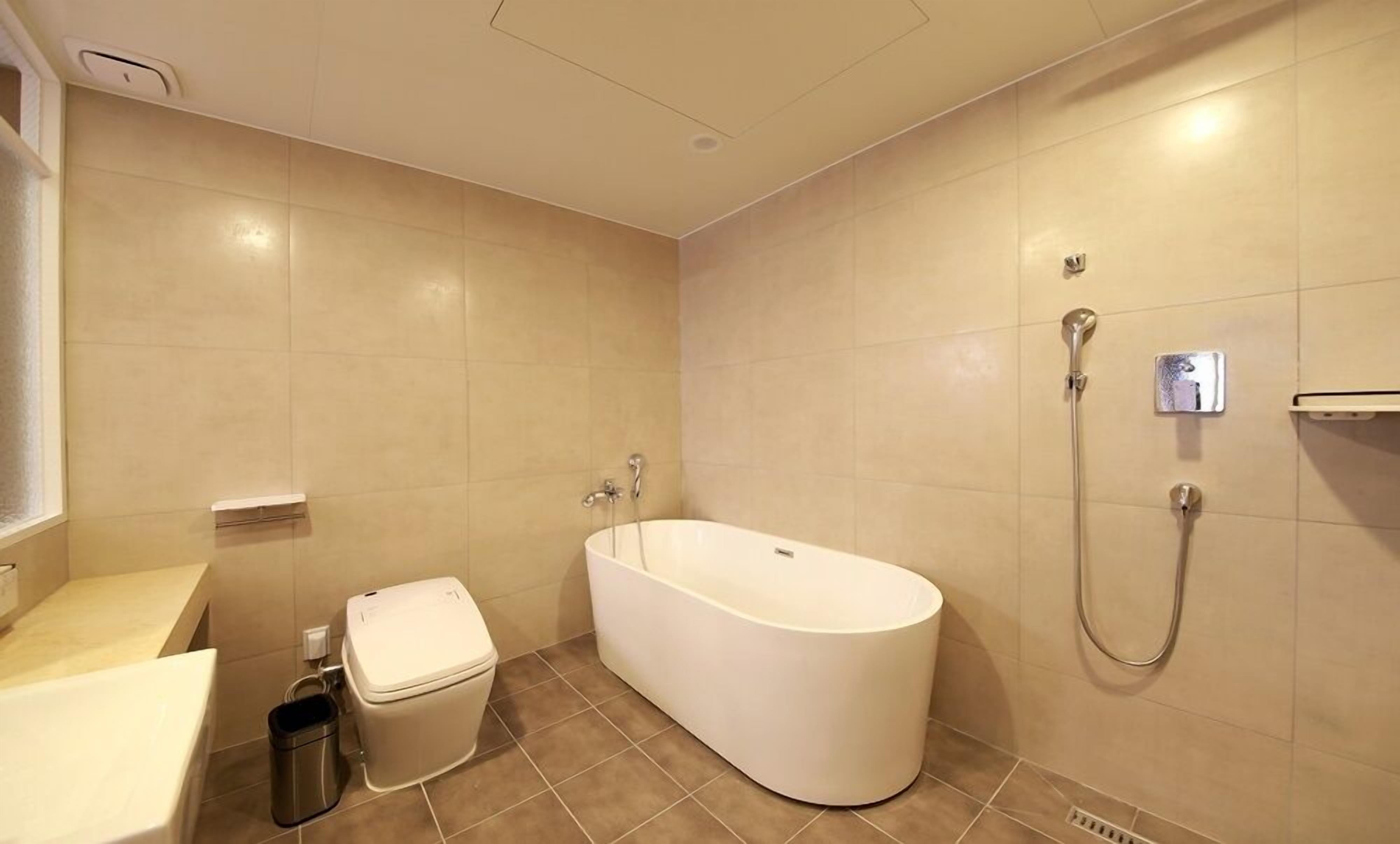 premium twin room | bathroom | free toiletries, hair dryer, bathrobes, slippers