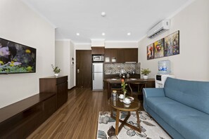 Deluxe Apartment, 1 Bedroom | Shared kitchen facilities | Fridge, microwave, electric kettle, rice cooker