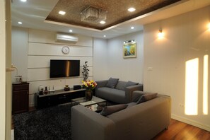Superior Apartment, 1 Bedroom | Living room | LCD TV - Hera Building (Hanoi)
