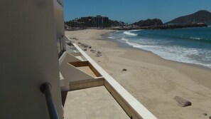 On the beach, sun-loungers, beach towels