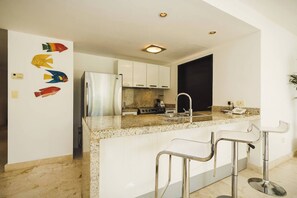 Fridge, microwave, coffee/tea maker, toaster