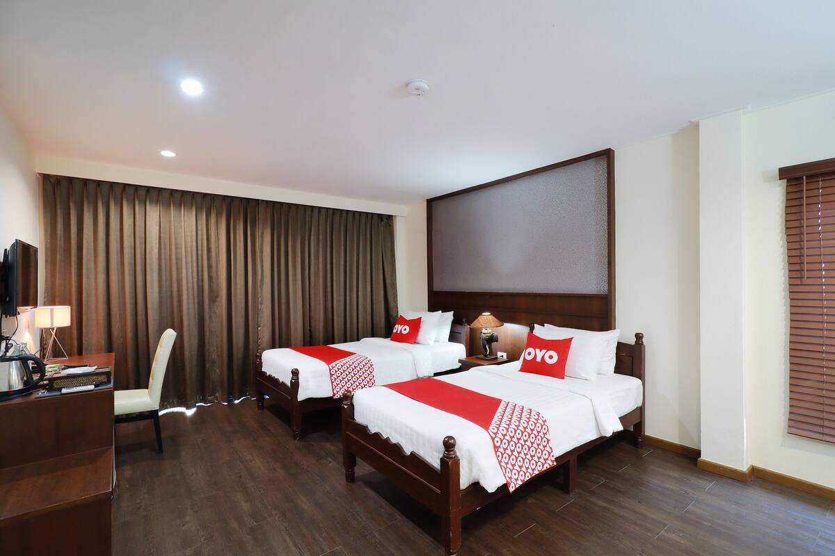 Habitación Deluxe con 2 camas individuales | Minibar, escritorio, wifi gratis y ropa de cama
