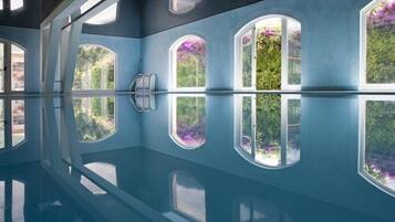 Indoor pool, seasonal outdoor pool, pool umbrellas, pool loungers