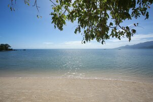 Private beach, free beach cabanas, beach towels, snorkeling