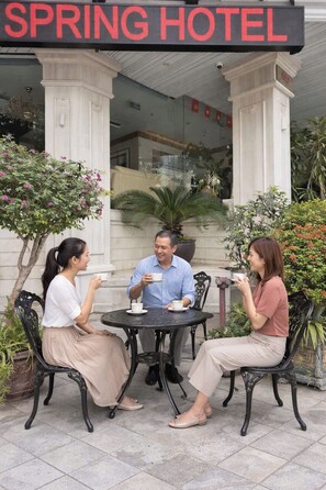 A hotel named SPRING HOTEL with a sign above the entrance. - Spring Hotel Hanoi (Hanoi)