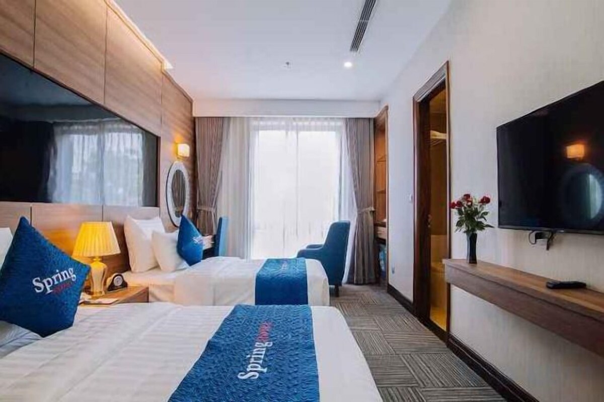 Luxe beddengoed, een minibar, een kluis op de kamer, een bureau