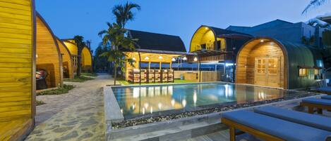 Outdoor pool, open 7:00 AM to 7:00 PM, pool umbrellas, sun loungers