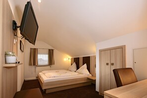 Tweepersoonskamer | Verduisterende gordijnen, gratis wifi, beddengoed