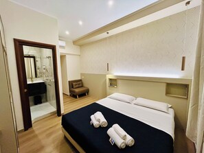 Chambre Deluxe Double ou avec lits jumeaux (Domiziana)