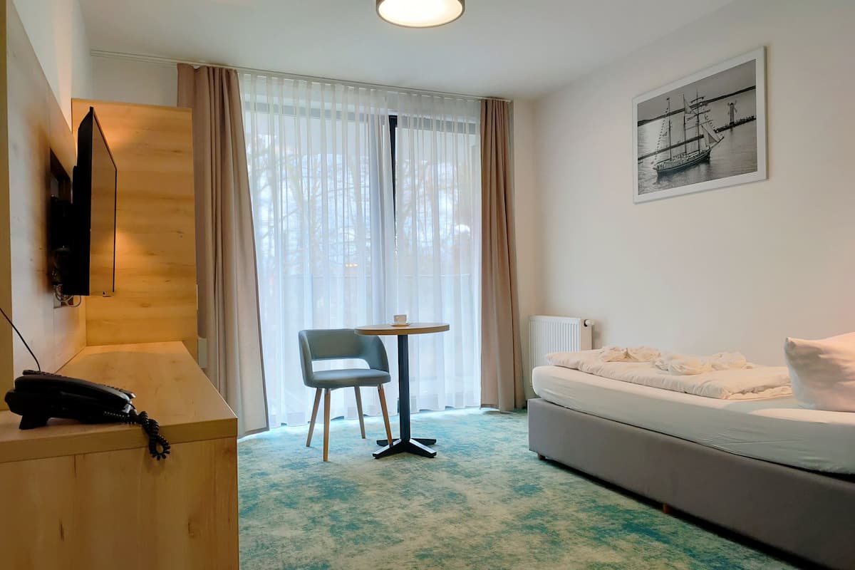 2 bedrooms, desk, laptop workspace, iron/ironing board