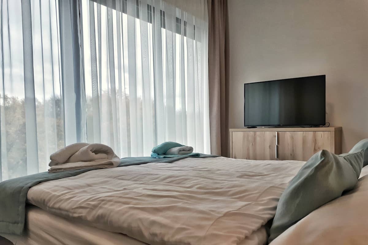 2 bedrooms, desk, laptop workspace, iron/ironing board