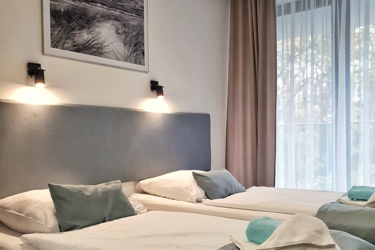 2 bedrooms, desk, laptop workspace, iron/ironing board