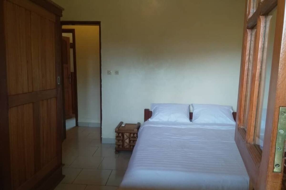 Maison Confort, Plusieurs lits, non-fumeur, vue sur le jardin | 3 chambres, fer et planche Ă repasser, literie fournie