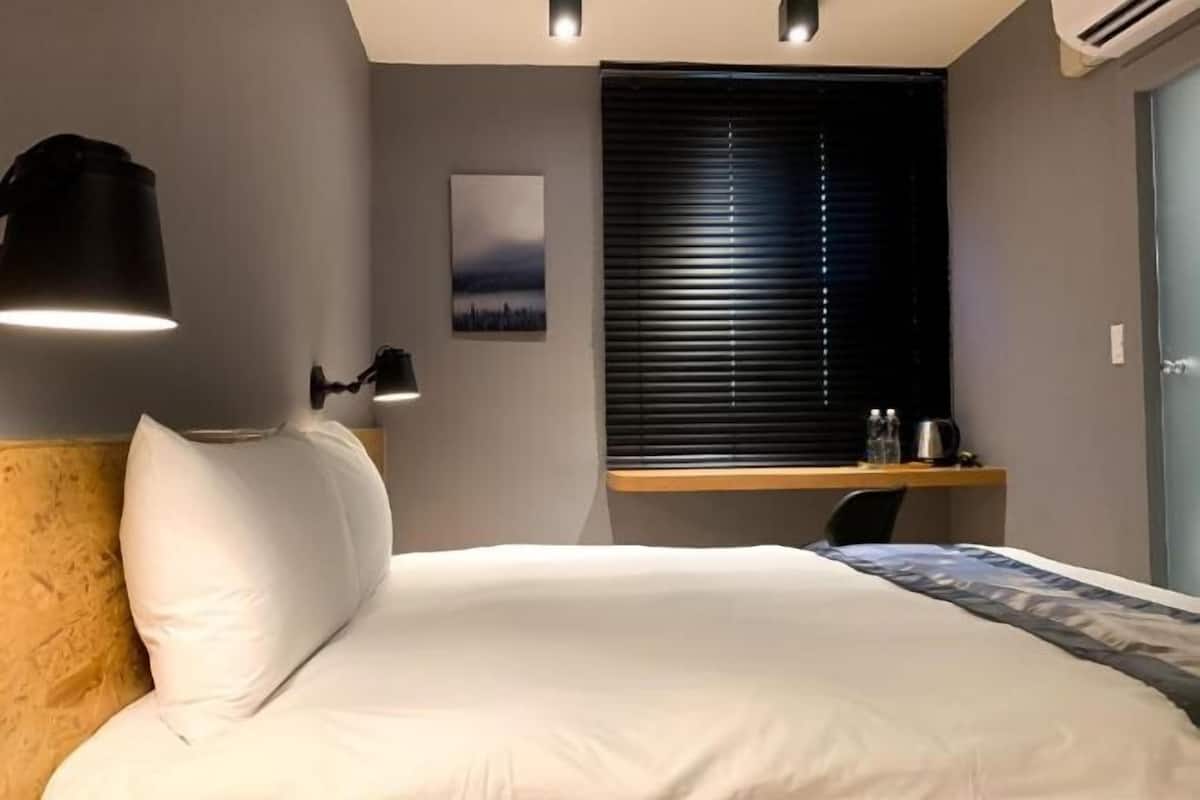 Desk, blackout curtains, soundproofing, free WiFi