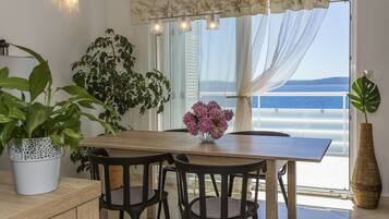 Panorama-lejlighed - 2 queensize-senge - ikke-ryger | Stue | Fladskærms-tv