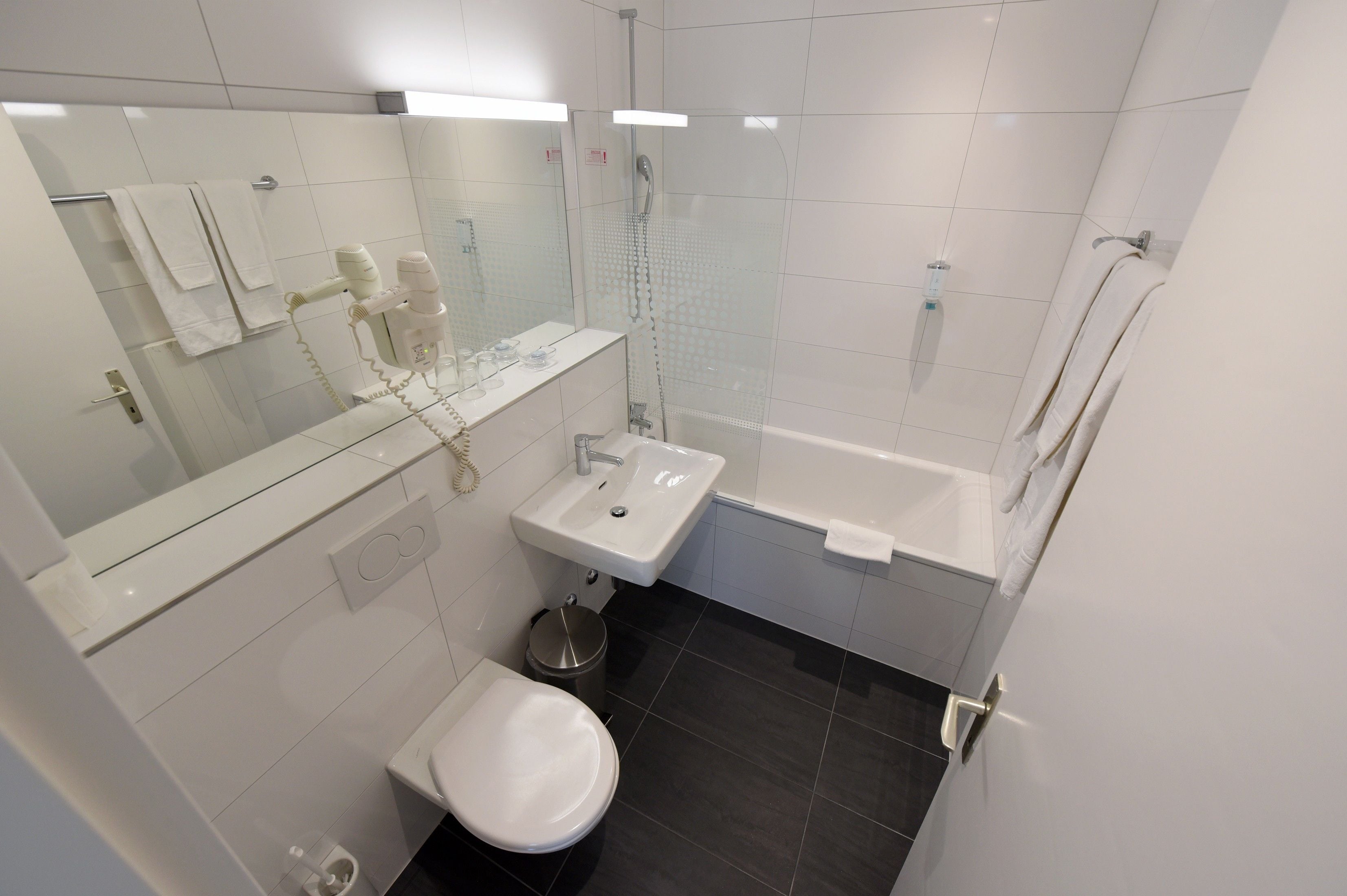 twin room | bathroom | shower, hair dryer, towels