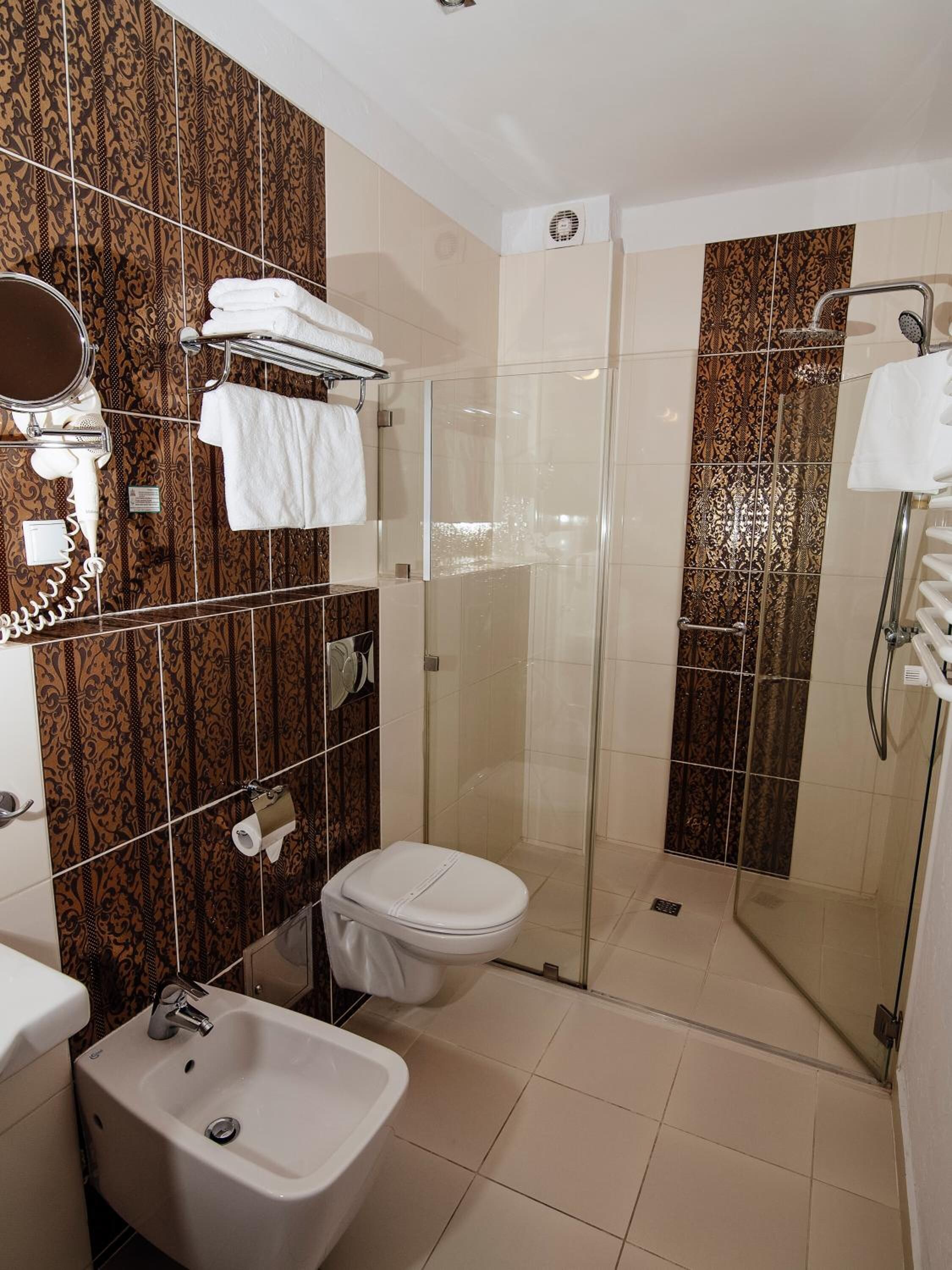 shower, free toiletries, hair dryer, slippers