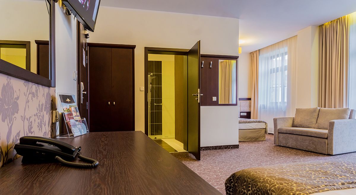 superior room | in-room safe, desk, blackout curtains, iron/ironing board