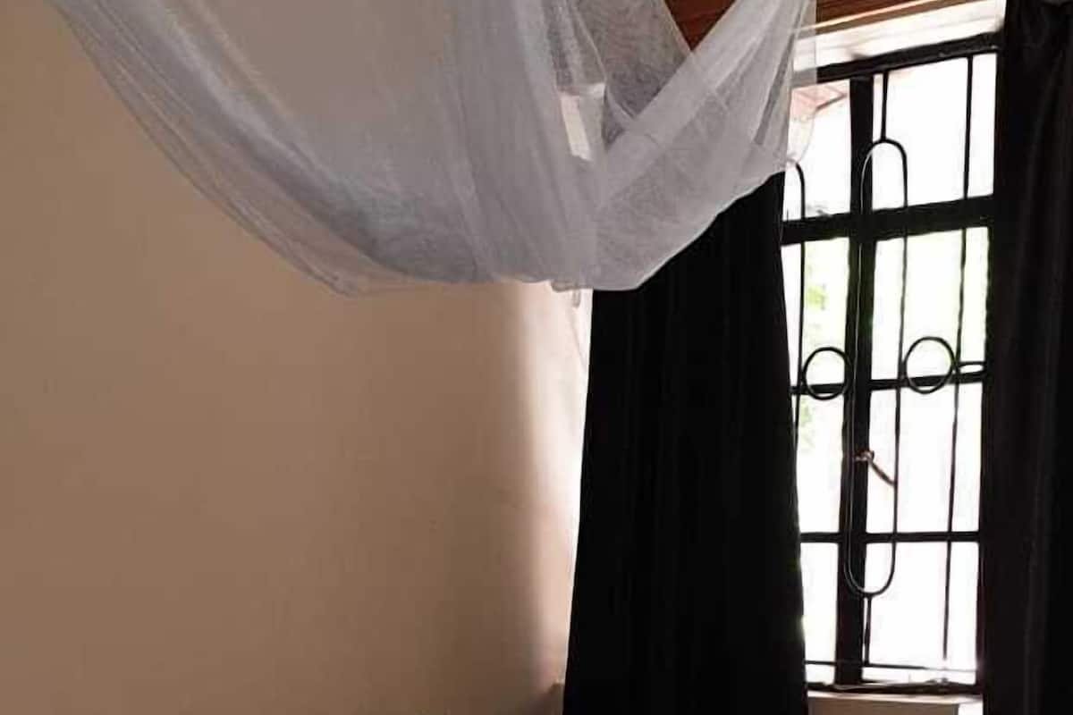 Room, 1 Double Bed, Shared Bathroom | Blackout drapes, iron/ironing board, free WiFi, bed sheets