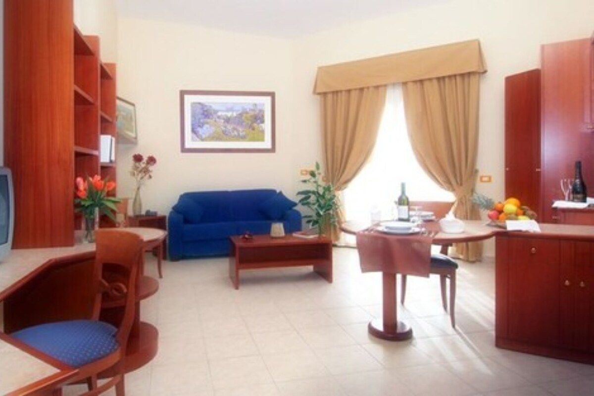 Standard Apartment, 1 Bedroom | Living area | TV