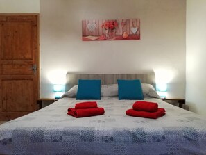 Family Quadruple Room, 1 Bedroom | Individually decorated, individually furnished, desk, blackout drapes