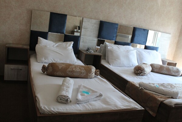 Premium bedding, down duvets, in-room safe, blackout curtains